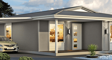 A modular home with a car parked in front, showcasing innovative designs for small houses.