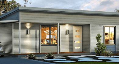 A modular home with a car parked in front, showcasing innovative designs for small houses.